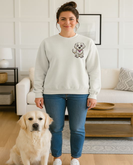 Woman wearing a light gray sweatshirt with a dog graphic, standing next to a dog in a living room.